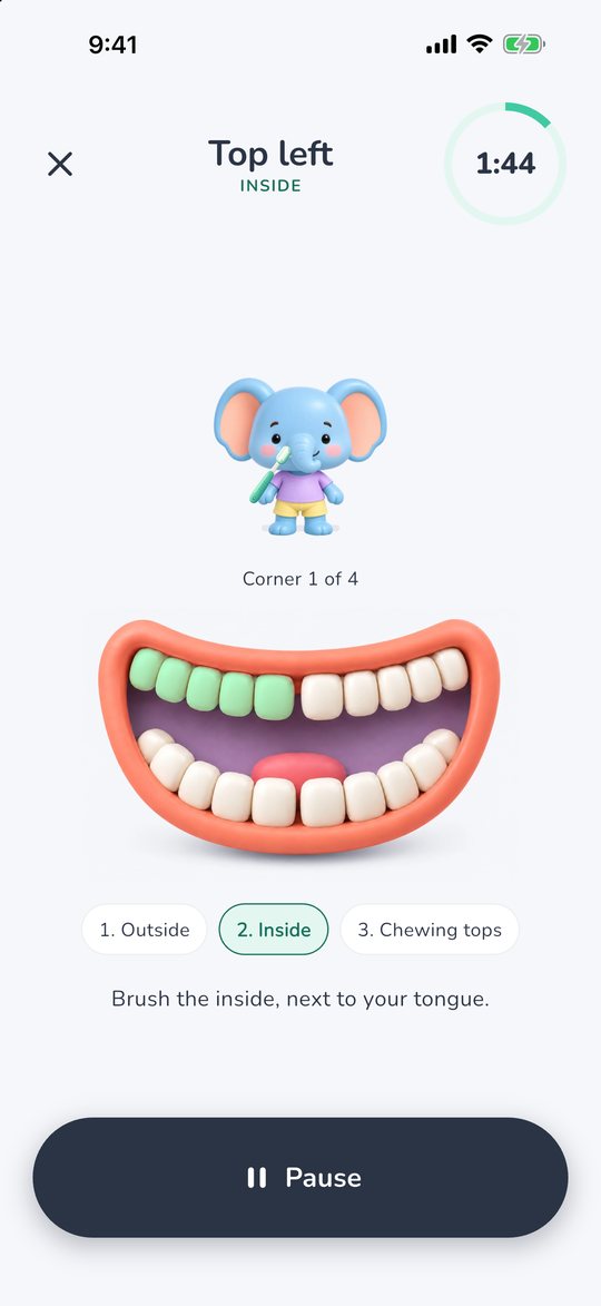 The app shows where to brush, with Mochi and a two-minute timer